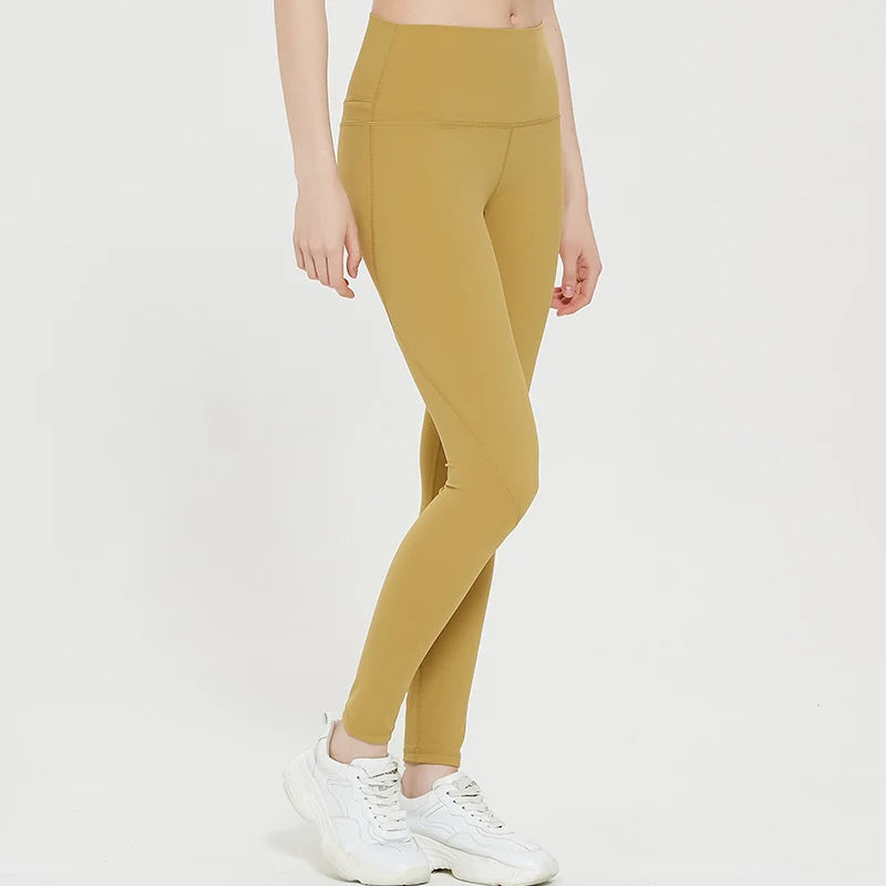 Spandex Sports Shorts in mustard yellow, designed for flexibility and durability, featuring a snug fit and elastic waistband.