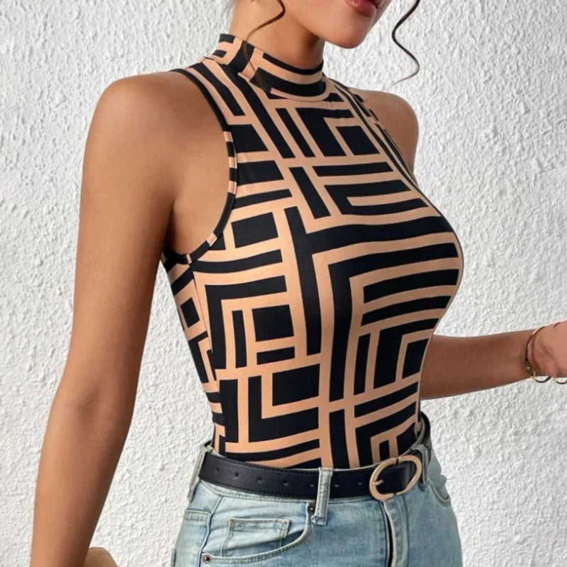 Fashionable women's tank top with geometric pattern, paired with high-waisted jeans.
