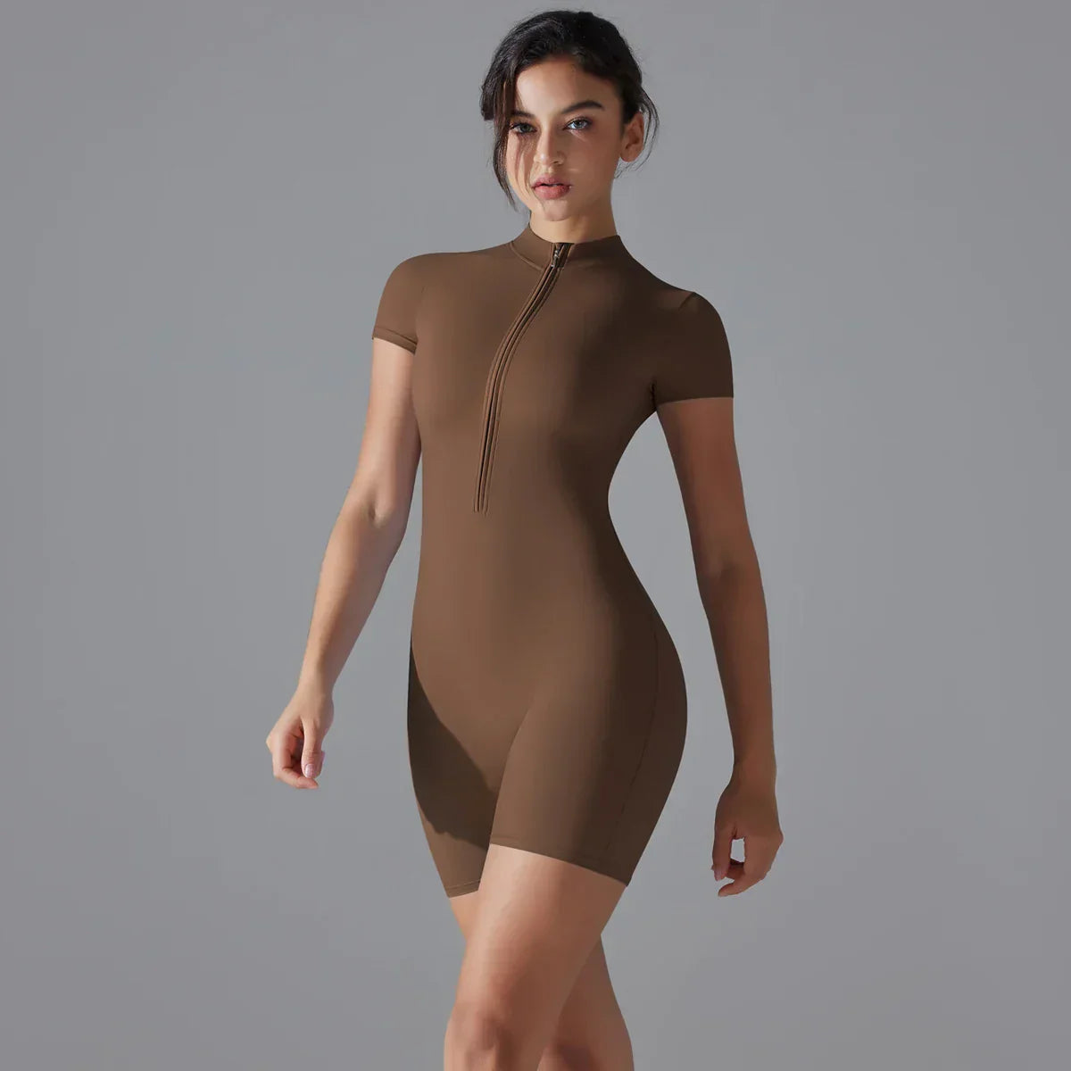 Zipper Front Workout Bodysuit in brown, featuring a sleek design and front zipper for ease and style. Perfect for gym, yoga, or casual outings.