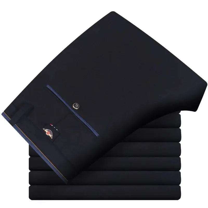 Business Casual Suit Pants in black, featuring a sleek design with buttoned pocket detail, stacked neatly.