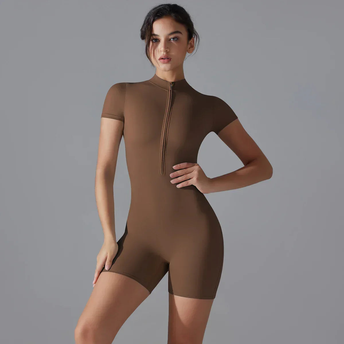 Brown Zipper Front Workout Bodysuit for women providing support and style.