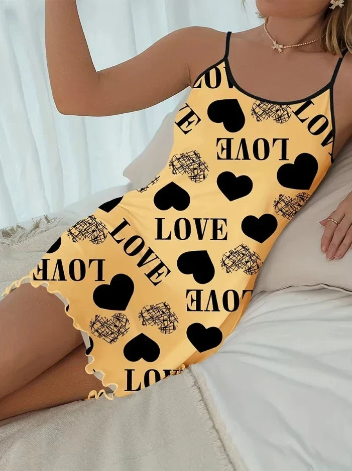 Summer Backless Ice Silk Nightgown with black hearts and LOVE print on yellow fabric, elegant and breathable sleepwear.