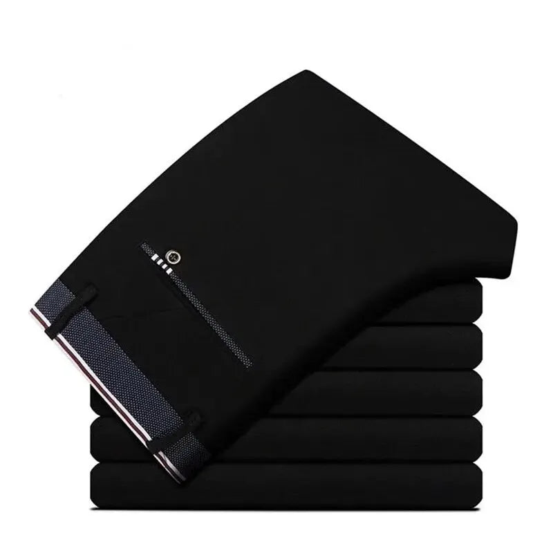Black business casual suit pants stacked neatly.