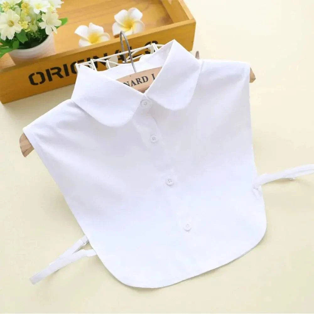 Detachable shirt collar in white, displayed on a hanger, highlighting its polished and versatile style for enhanced wardrobe options.