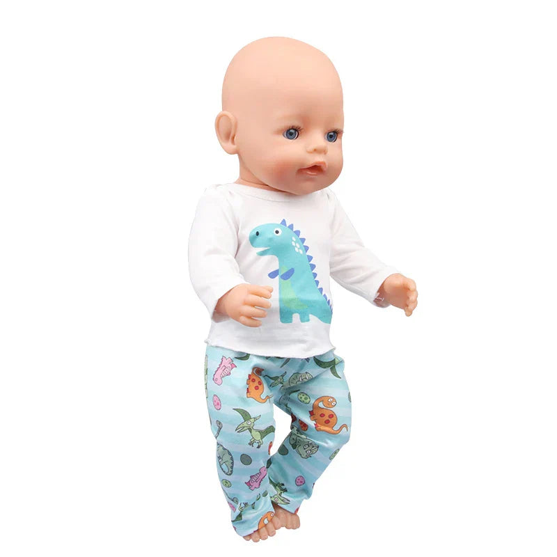 Soft Doll Pajama Set featuring adorable dinosaur design on doll mannequin.