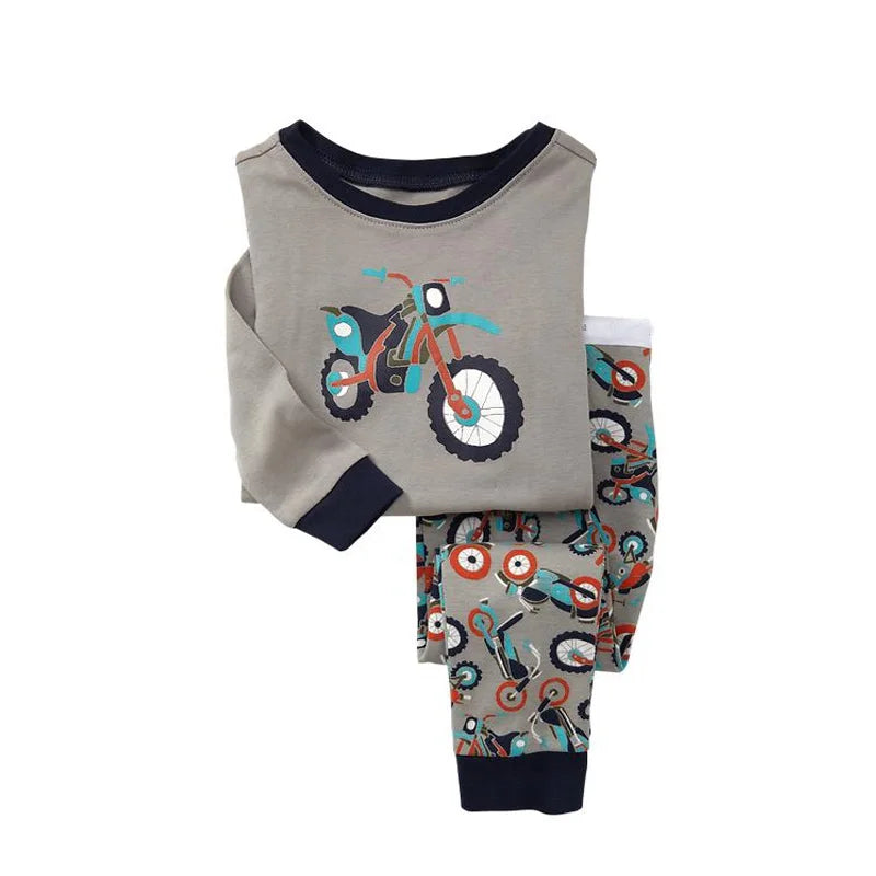 Kids Animal Pajama Set in gray knitted cotton, with a colorful motorcycle print, dark navy trim, and matching patterned pants.
