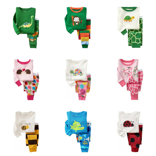 Kids Animal Pajama Set in cotton knit with long sleeves and playful animal prints in assorted bright colors, paired with patterned pants.