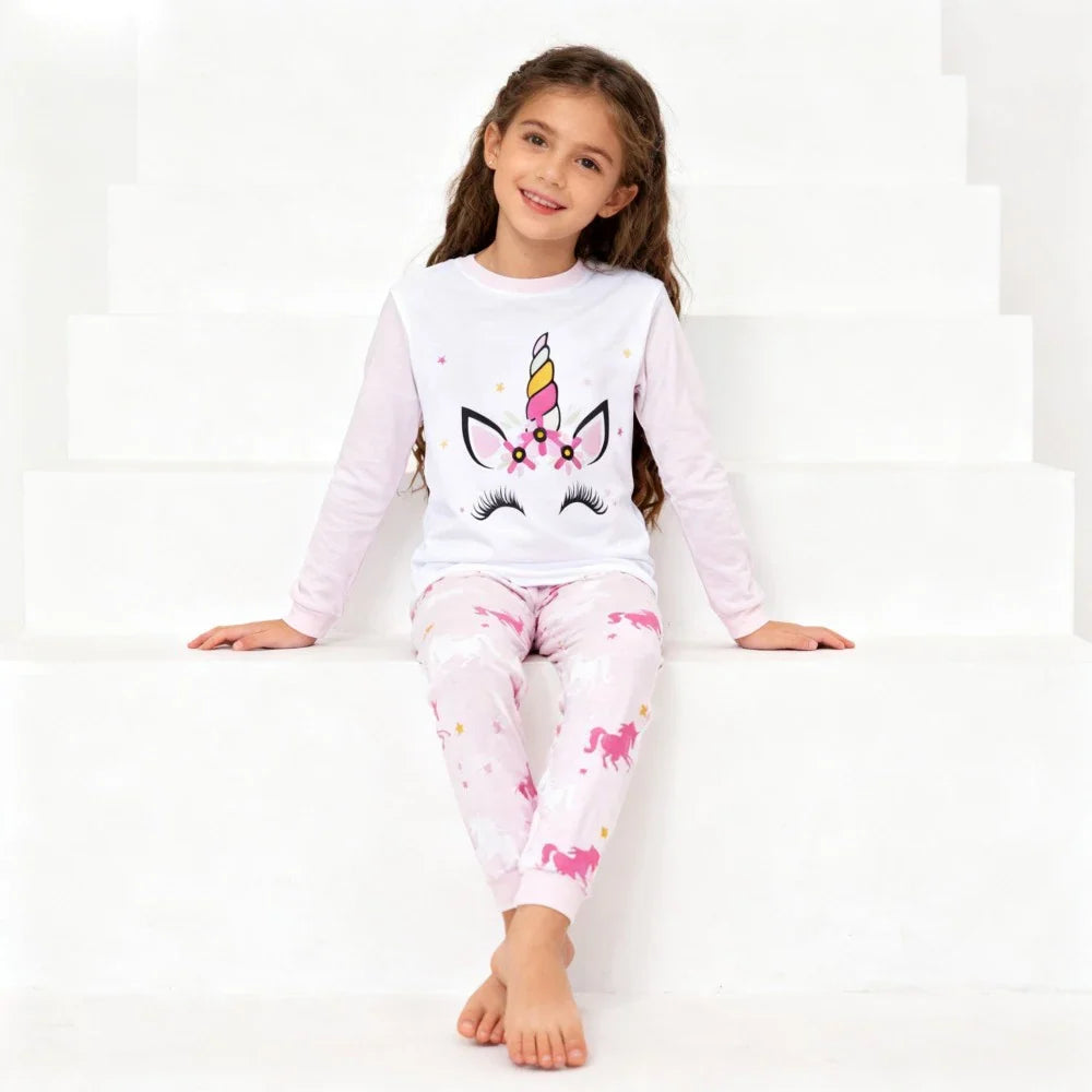 Kids Animal Pajama Set in soft white knit fabric, featuring a unicorn face top and matching pink animal-print pants.