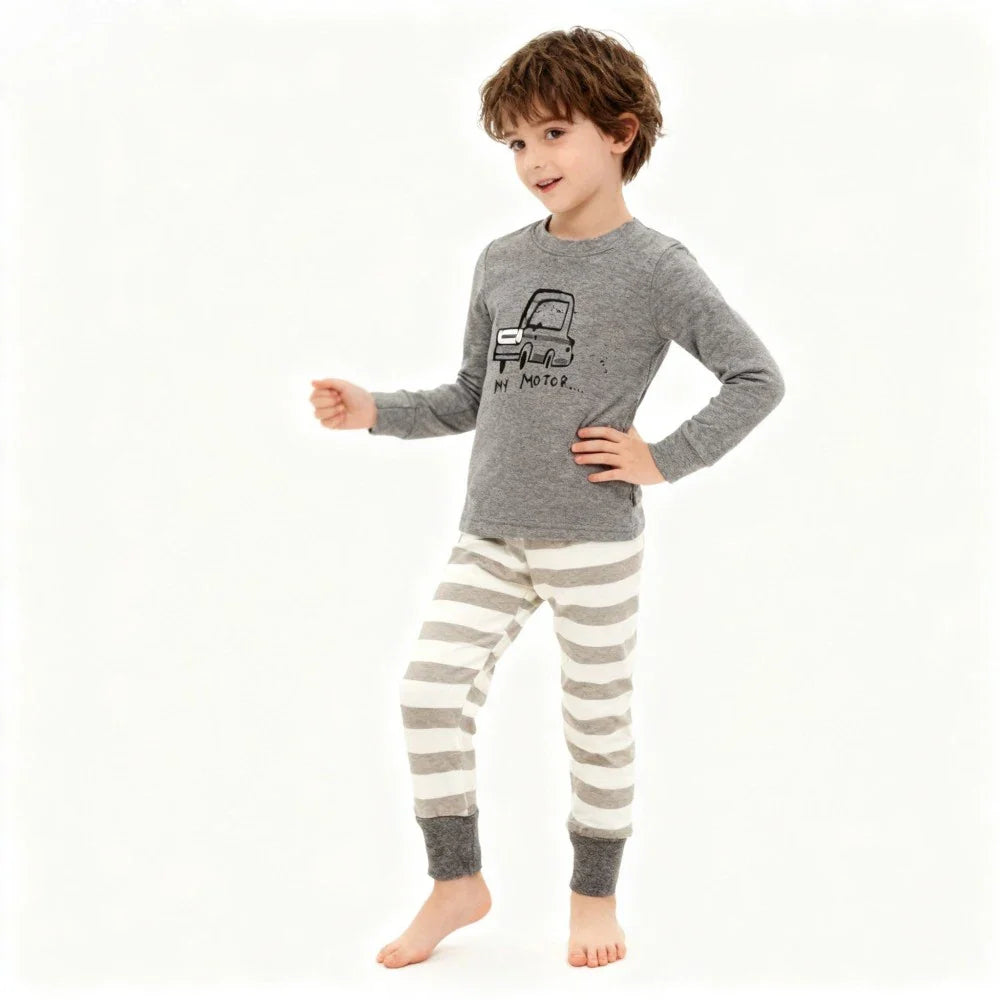 Kids Animal Pajama Set in gray cotton knit, with a long-sleeve truck-print top and cream-and-gray striped pants.