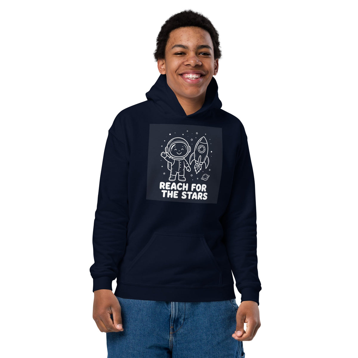 Youth hoodie in dark navy cotton-blend fleece, featuring a white astronaut and rocket graphic with the Reach for the Stars design and front pouch pocket.